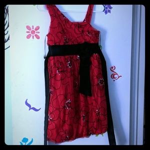 A beautiful red, black, and silver dress